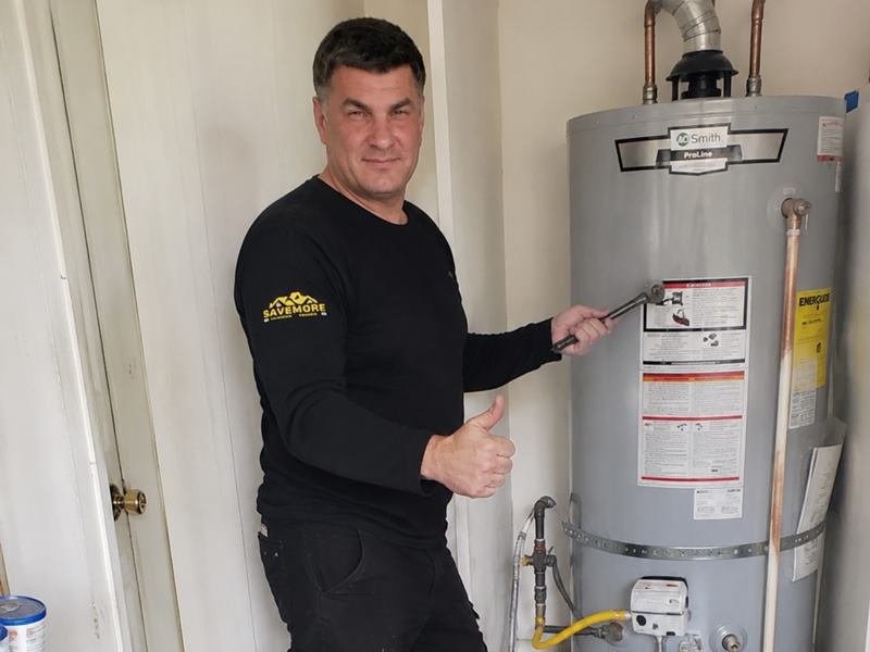 Technician replacing a water heater in Las Vegas